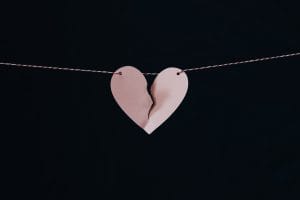 a broken heart to symbolise making partner by fixing a damaged reputation