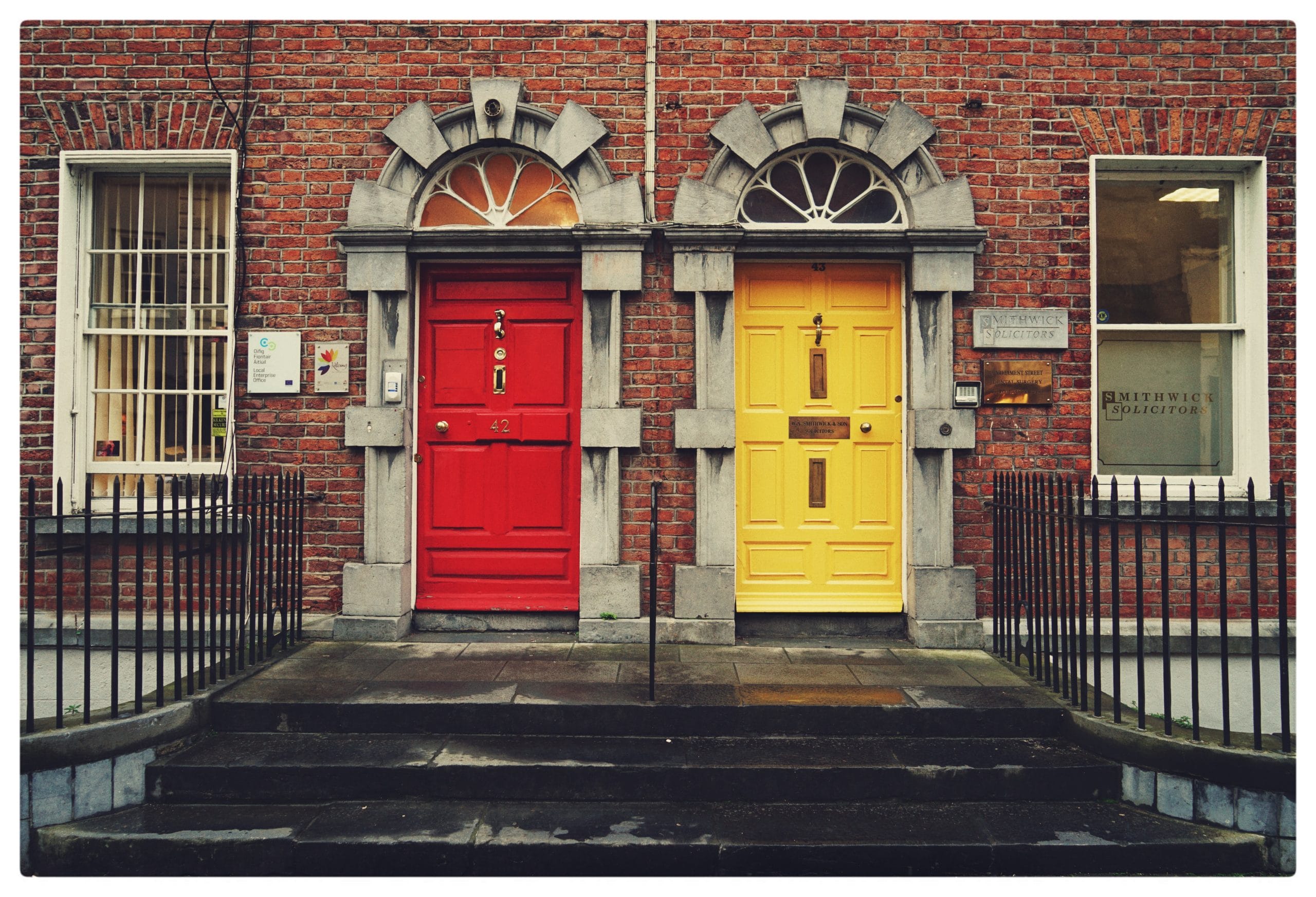 a red and yellow door to represent offering alternative ways