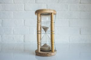 an hourglass to symbolise checking your firm is solvent when you do your due diligence on a firm