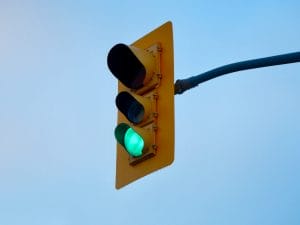 a green traffic light to represent how good it is when you prepare your virtual team for the long haul