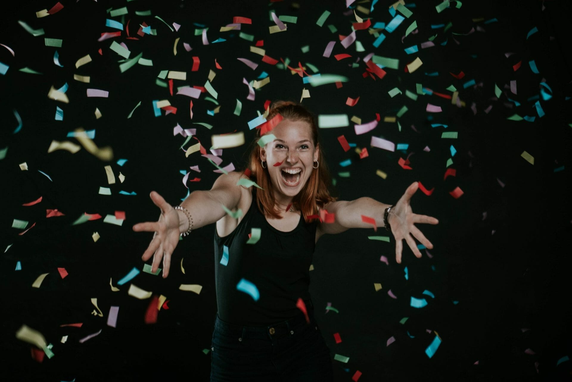 a woman celebrating to symbolise being successful in the partnership vote