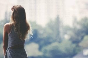 a woman standing taking a break